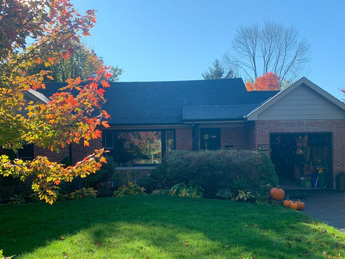 Kitchener home before external facelift. Red brick.