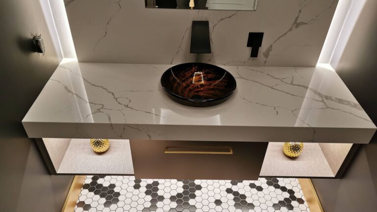Waterloo bathroom: custom floating vanity with hexagon tile floor.
